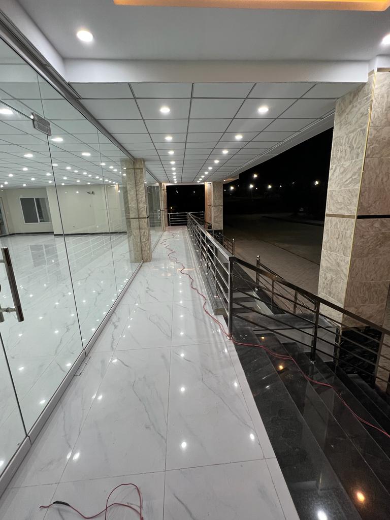 Karachi Office construction - Interior corridor looking towards the entrance doors