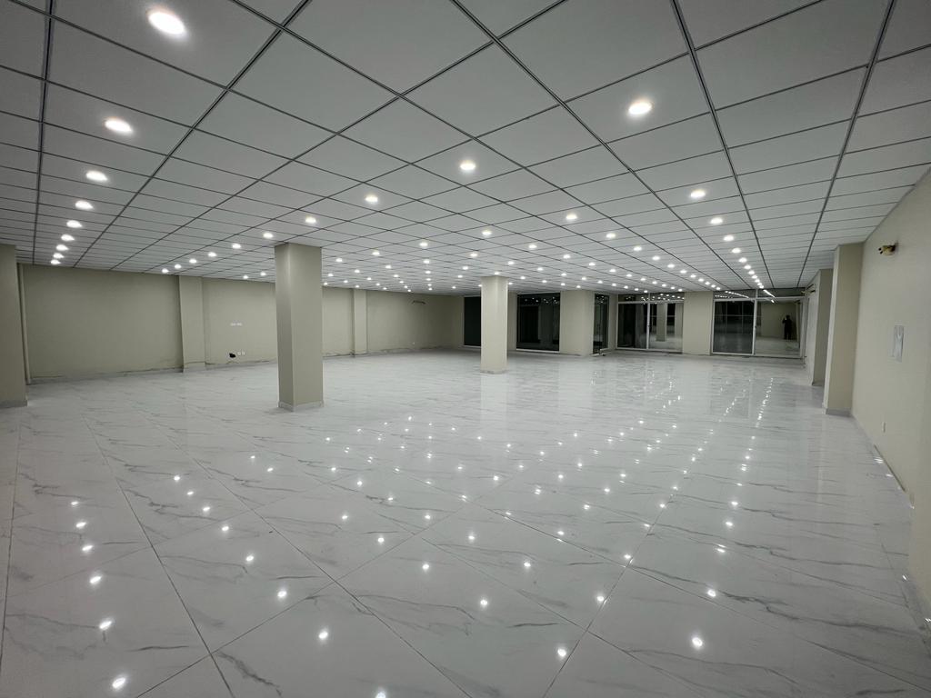 Karachi Office construction - Front perspective view detailing glass curtain walls